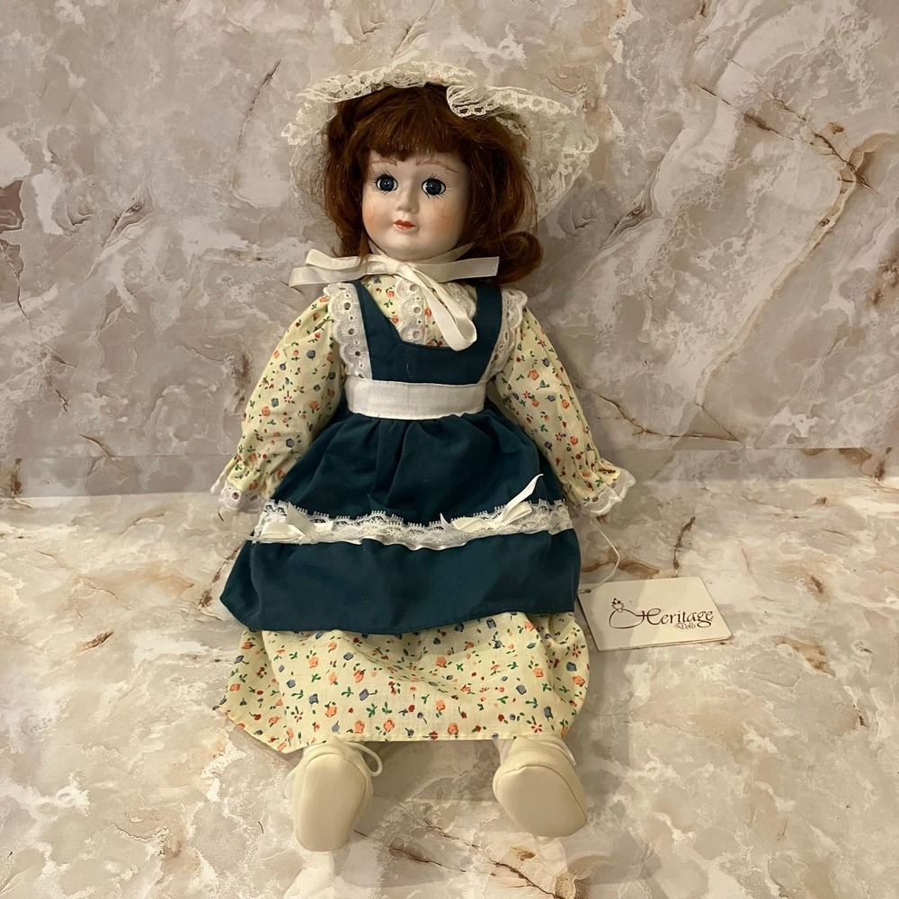 Vintage Heritage Musical Porcelain Doll from Heritage Collectors Wind Up Doll